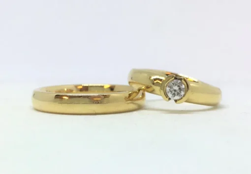 CT4 - 14 kt vielsesringe med 0,25 ct
